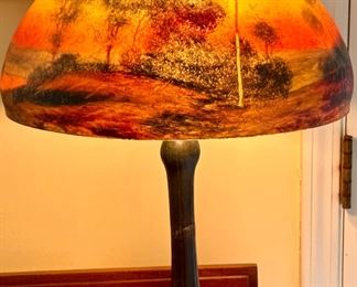 Beautiful Handel Lamp circa 1920-1930's. Both the Base and Lampshade are signed.  The shade is # 6504.  The colors of this lamp is amazing.  Excellent condition with no cracks or chips in the shade.