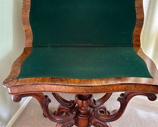 Stunning Victorian Burr Walnut Card/Game Table. Circa 1860's in Excellent Museum Quality Condition.. Features Rotating Top and Opens for larger surface with Green Felt Game Surface.  Size: 33.8" W x 16.9" D x 28.3" H