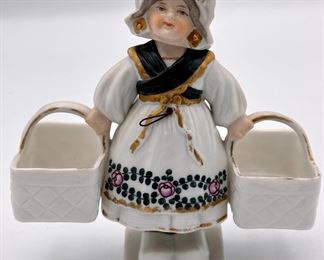 Vintage Ceramic Dutch Girl with 2 Baskets that move up and down.