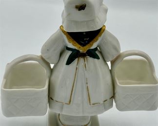 Vintage Ceramic Dutch Girl with 2 Baskets that move up and down.