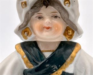 Vintage Ceramic Dutch Girl with 2 Baskets that move up and down.