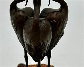 Signed Japanese Art Deco Bronze Okimono of 3 Cranes each on one leg with up tuned beaks  balancing a crystal ball in a live edge wood base.