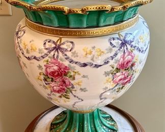 Beautiful Royal Doulton Vase with a pedestal base and fluted top.  Colors are absolutely vivid and in perfect condition.  Circa 1920's