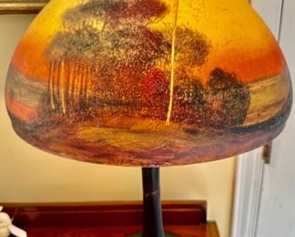 Beautiful Handel Lamp circa 1920-1930's. Both the Base and Lampshade are signed.  The shade is # 6504.  The colors of this lamp is amazing.  Excellent condition with no cracks or chips in the shade.