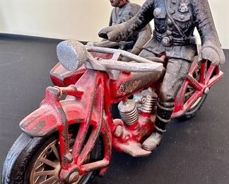 Vintage Cast Iron Hubley Toy Indian Motorcycle with Side Car and 2 Policeman.  All Original including tires and apron. weight in 4 lbs.