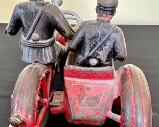 Vintage Cast Iron Hubley Toy Indian Motorcycle with Side Car and 2 Policeman.  All Original including tires and apron. weight in 4 lbs.