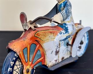 Rare 1930's Louis Marx Tin Litho Wind-Up Toy Motorcycle with Policeman.