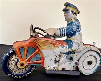 Rare 1930's Louis Marx Tin Litho Wind-Up Toy Motorcycle with Policeman.