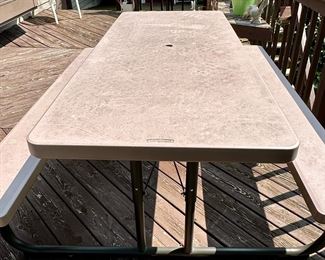 LifetimeLifetime Picnic Table with Bench seating on both sides. Excellent Condition and folds for storage.