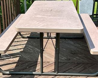 Lifetime Picnic Table with Bench seating on both sides. Excellent Condition and folds for storage.