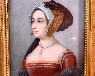 This small painting in a gilt frame appears to be a portrait of Anne Boleyn.  Anne Boleyn c. 1501 or 1507 – 19 May 1536) was Queen of England from 1533 to 1536, as the second wife of King Henry VIII. The circumstances of her marriage and of her execution by beheading for treason and other charges made her a key figure in the political and religious upheaval that marked the start of the English Reformation.