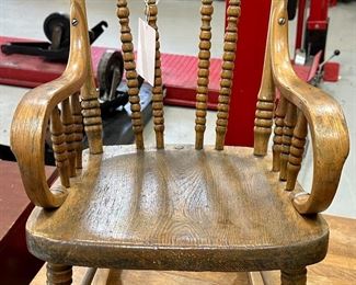 Antique Child's Rocking Chair with turned spindles and hand carved.  
