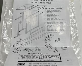 Rio Creations "Cutting Table" Folding work, sewing, dining table in White partical board on wheels for easy storage and utility. Original Instruction sheet.