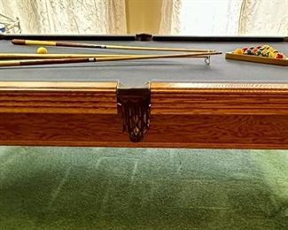 8' Professional Pool Table by Olhausen with Royal Blue Felt. Classic Oak, Leather Pockets, Cue Rack and Cues with all accessories including Cover.  We have a couple of companies that  can move this for you.