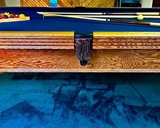 8' Professional Pool Table by Olhausen with Royal Blue Felt. Classic Oak, Leather Pockets, Cue Rack and Cues with all accessories including Cover.  We have a couple of companies that  can move this for you.