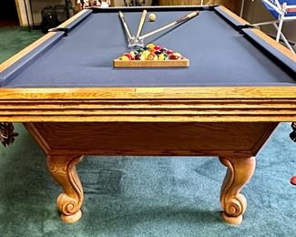 8' Professional Pool Table by Olhausen with Royal Blue Felt. Classic Oak, Leather Pockets, Cue Rack and Cues with all accessories including Cover.  We have a couple of companies that  can move this for you.