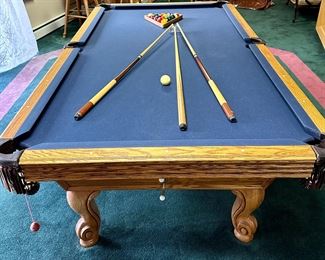 8' Professional Pool Table by Olhausen with Royal Blue Felt. Classic Oak, Leather Pockets, Cue Rack and Cues with all accessories including Cover.  We have a couple of companies that  can move this for you.