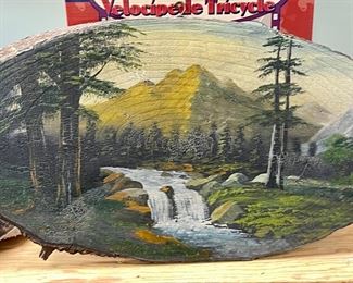 Beautiful painting on a wood slice of tree