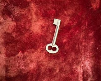 French 19th C. Louis XVI Mahogany Ormolu Display Table with Gold Gilt Detail and Glass Top that opens the case with original Key.  One is selling on 1stDibs for $18,800 to give you an idea on this piece.