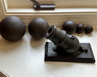 Cast Iron Signal Cannon with 5 different size Cannon Balls.