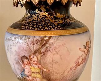 French Sevres Porcelain Urn on Bronze Door Pedestal Circa 19th Century.  Ormolu detail and awesome Lions on middle section.
