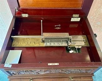 Carved Mahogany Case with Stella Disc Music Box. Includes Base.  additional discs are included.    This music box has the most amazing sound!  