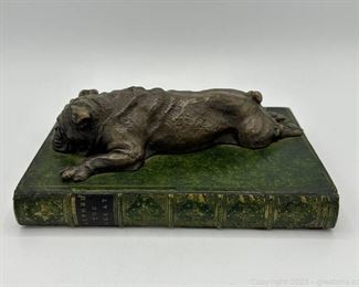 Sleeping British Building Sculpture on Decorative Green Book