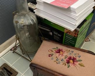 That flower covered piece isn't attached to anything. It's just another loose stool.