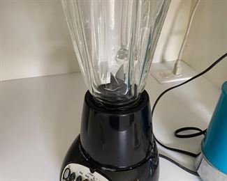 What's green and red and goes around and around at 300 miles an hour?