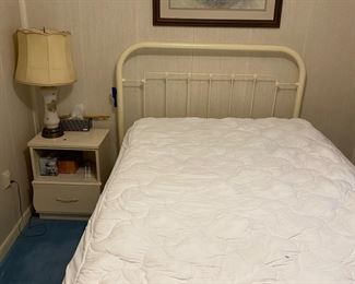Iron bed.