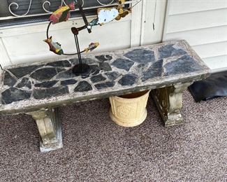 Stone bench. Perfect for sitting downtown in a railway station one toke over the line.