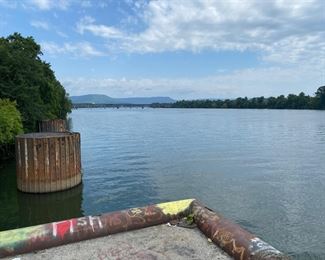 If you friend wants to fish while you're here try the barge dock across from the Tennessee Alloy Company. Looking north toward the bridge of Bridgeport fame.