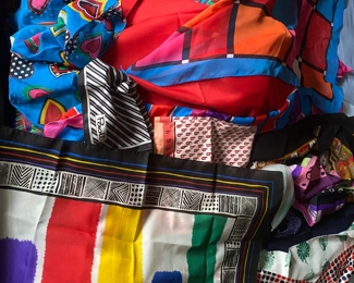 Basket full of beautiful vintage scarves.