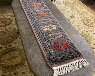 Rug on table.