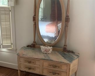 Marble top vanity.