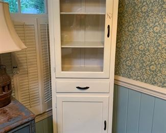 Cool old corner cabinet.