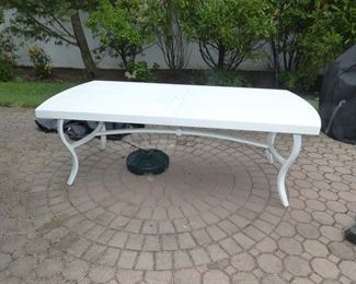 2 years old, always covered "Like new"  outdoor table and 6 chairs, umbrella & small side table (all stored in garage)