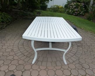 2 years old, always covered "Like new"  outdoor table and 6 chairs, umbrella & small side table (all stored in garage)