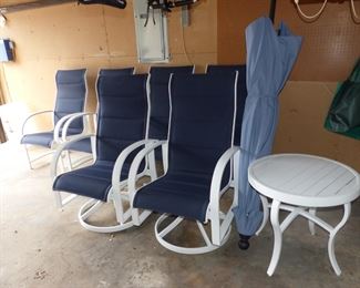 2 years old, always covered "Like new"  outdoor table and 6 chairs, umbrella & small side table (all stored in garage)