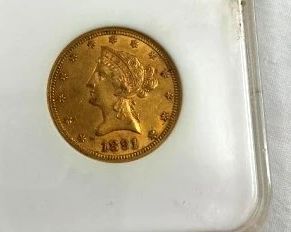 CLOSEUP GOLD LIBERTY HEAD COIN