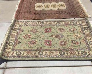 Two Different Patterned Rugs