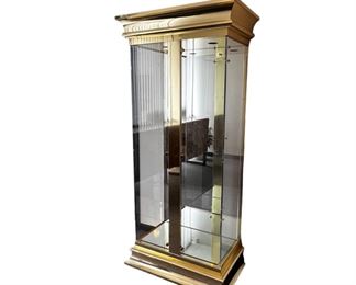 $1650 USD     Mastercraft Brass & Glass Display Case Cabinet MTF153-18     Description: Mastercraft was one of a handful of 20th century American furniture companies that produced beautifully designed and excellently crafted pieces. Mastercraft's founder William Doezema often employed well-known artisans such as John Widdicomb and Bernard Rohne to design for the Mastercraft label. Mastercraft, known for their artistic design, often used exotic woods and brass detailing. Offered is a Mastercraft display cabinet with highly polished lacquered brass and glass doors, along with 3 glass shelves and interior lighting. The Mastercraft cabinet of this design is quite rare.

Dimensions: 37.5W x 22.25D x 82H in

Condition: Used in excellent condition. There is one very minor indent on the left side lower base. Please see photo's for detail.

Location: Local pick up main floor warehouse storage.  Portland, OR. Shipper suggestions available upon request.      https://goodbyhello.com/products/copy-
