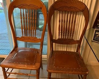 4 antique oak pressed back dining room chairs. 