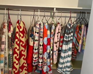 So many handmade quilts and afghans. From king size to baby quilt and some quilt tops.  Just need to be completed. 