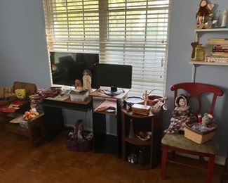 Desk, side table, chair, one of 3 TVs and computer monitor 