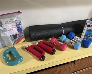 hand weights and yoga mat