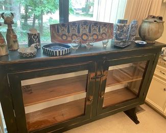 Pottery and signed ceramics - Storage console in distressed black and natural with glass doors