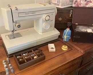 Sears Kenmore sewing machine with cabinet; antique and vintage thimbles, buttons, and notions