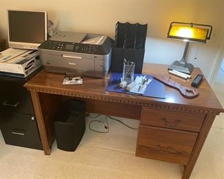 work desk, metal file cabinet, amber desk light, Cannon printer