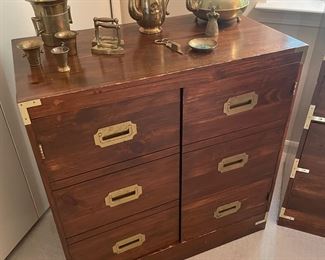 Brass accessories and 2-door cabinet with brass pulls and trim